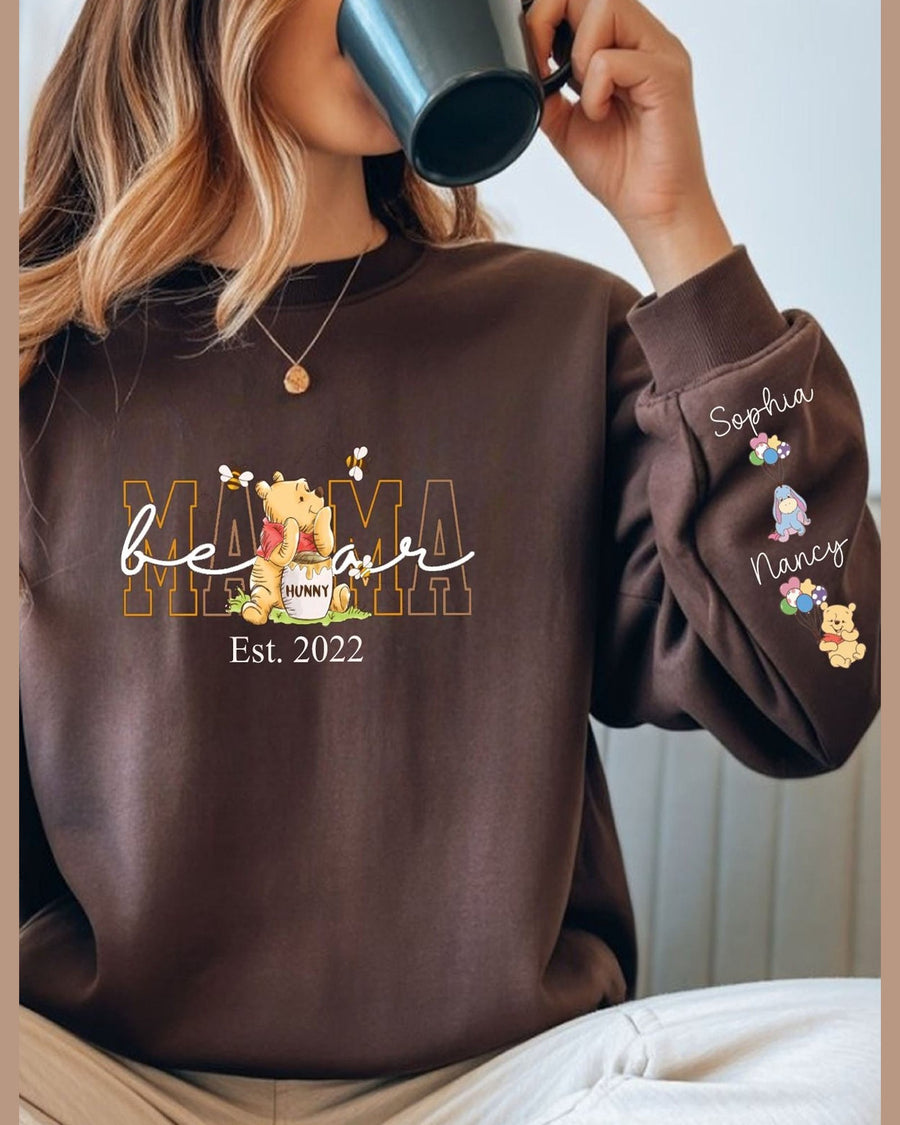 Brown Mama crewneck sweatshirt with Winnie the Pooh print and custom names on sleeve detail