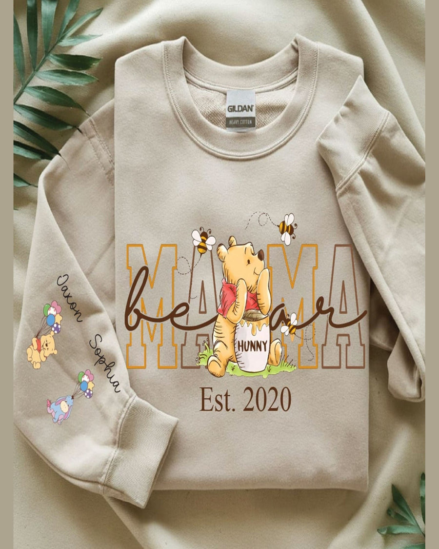 Beige personalized Mama crewneck sweatshirt with Winnie the Pooh graphic and custom names on sleeve