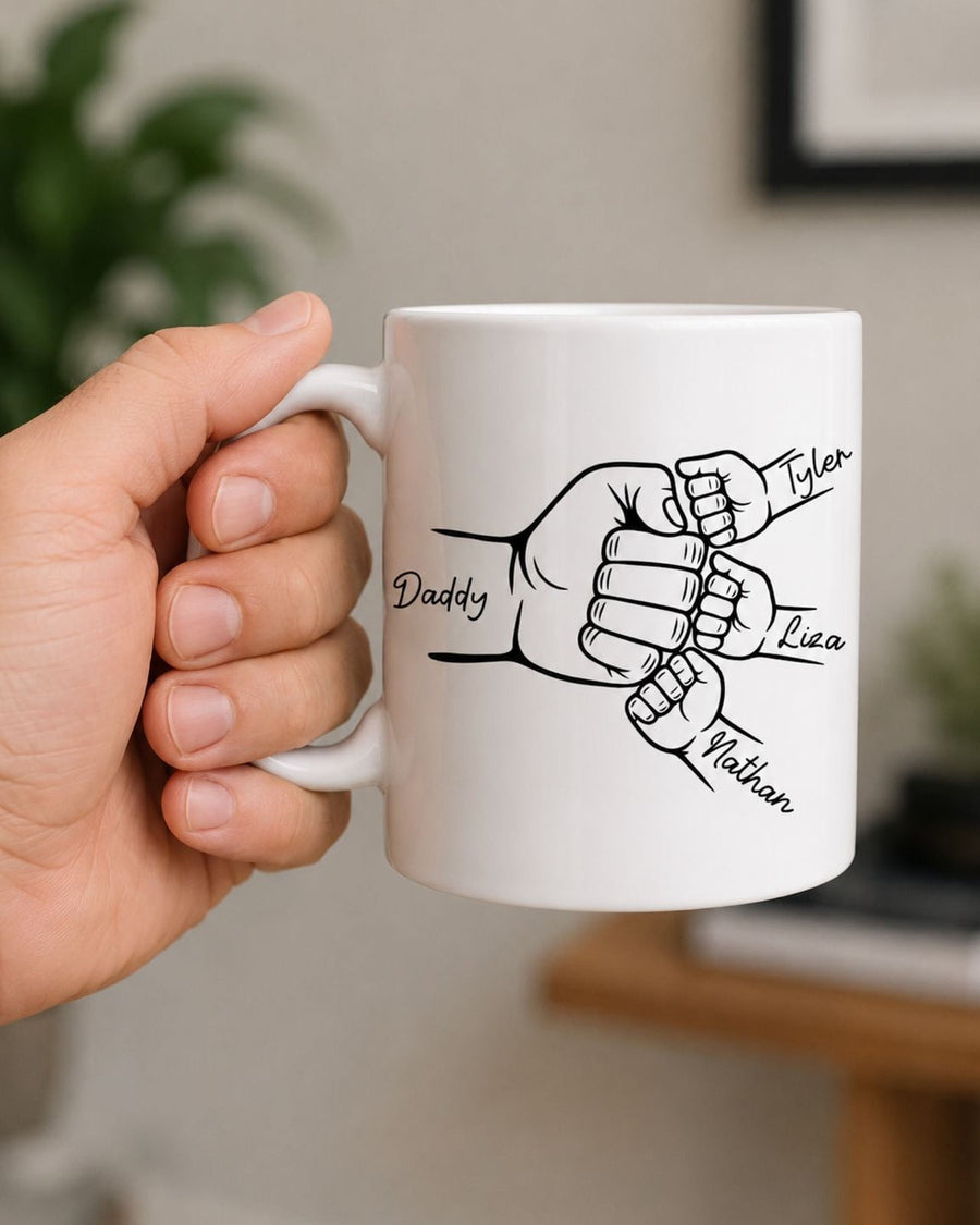 Custom family fist bump mug showing Daddy, Tyler, Liza, and Nathan names in black line art