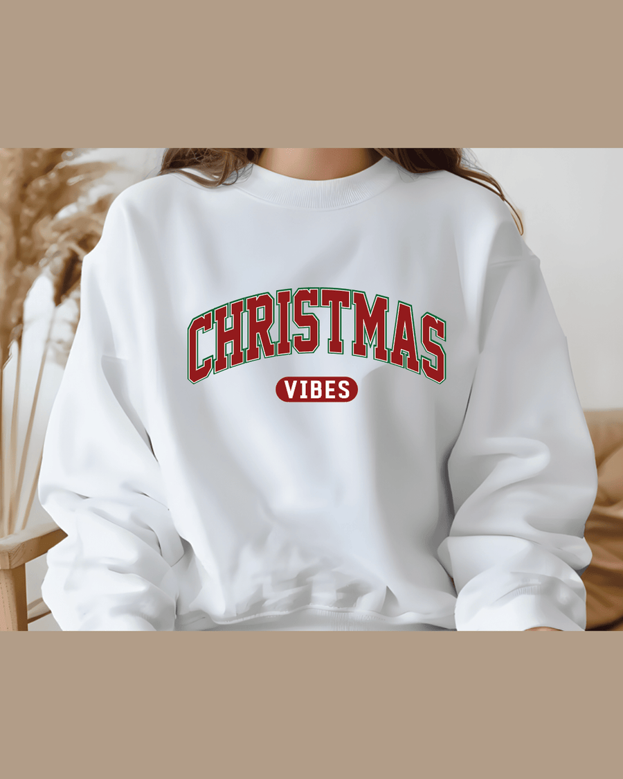 Custom white Christmas crewneck sweatshirt with red oval 'VIBES' logo for cozy winter wear