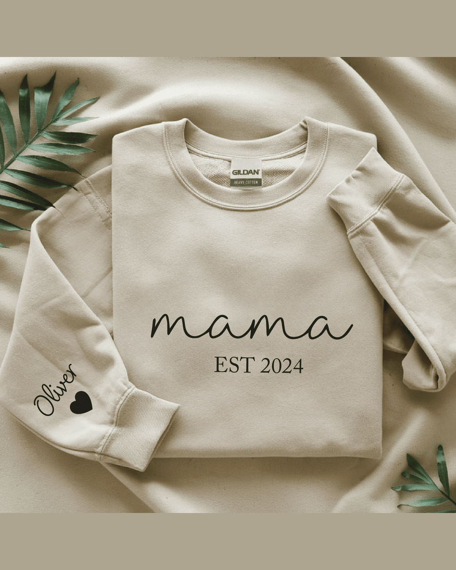 Cream Gildan heavy cotton sweatshirt with 'Oliver' sleeve name and 'mama EST 2024' chest design