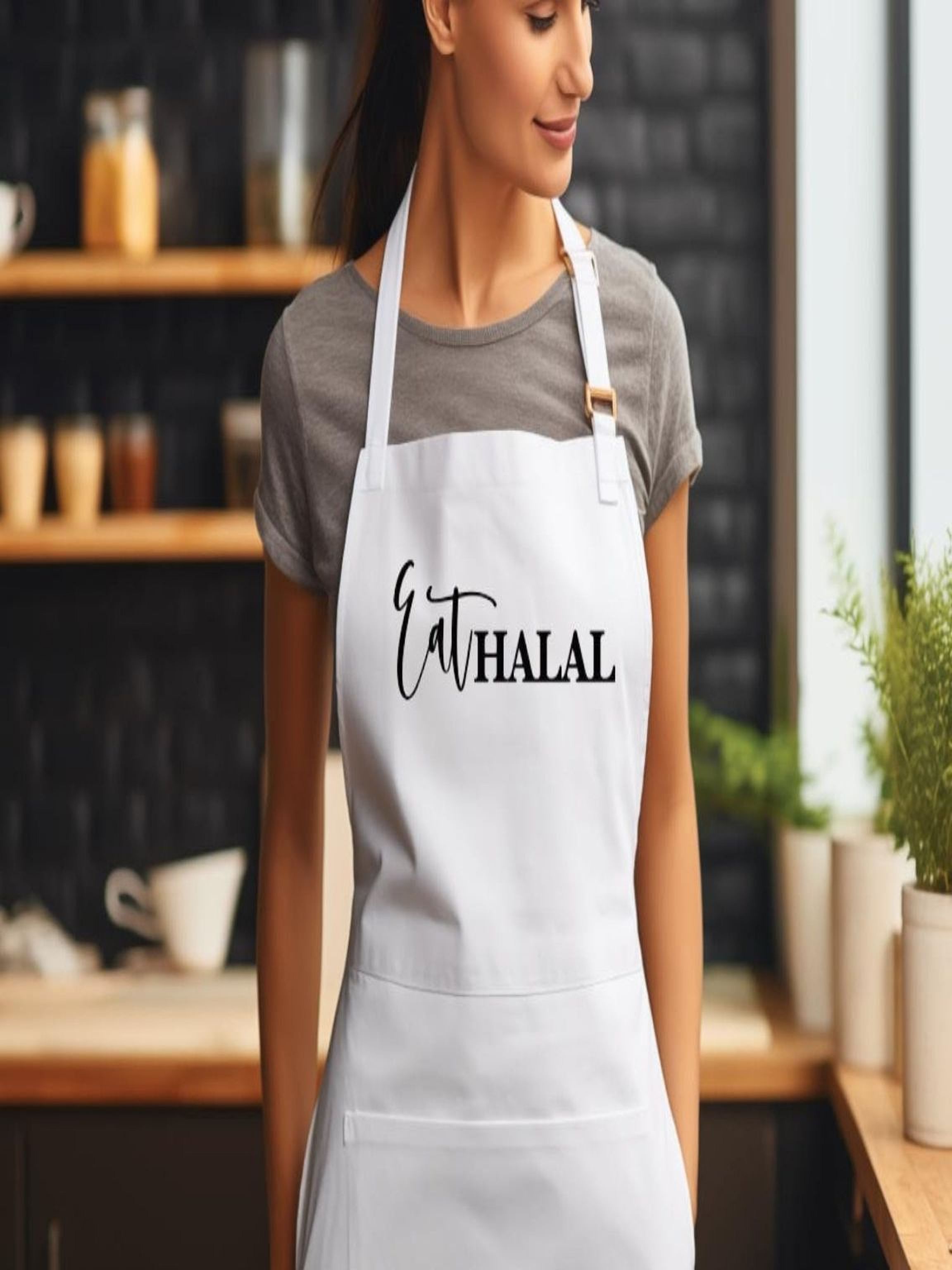 white Eat Halal Islamic apron in modern kitchen