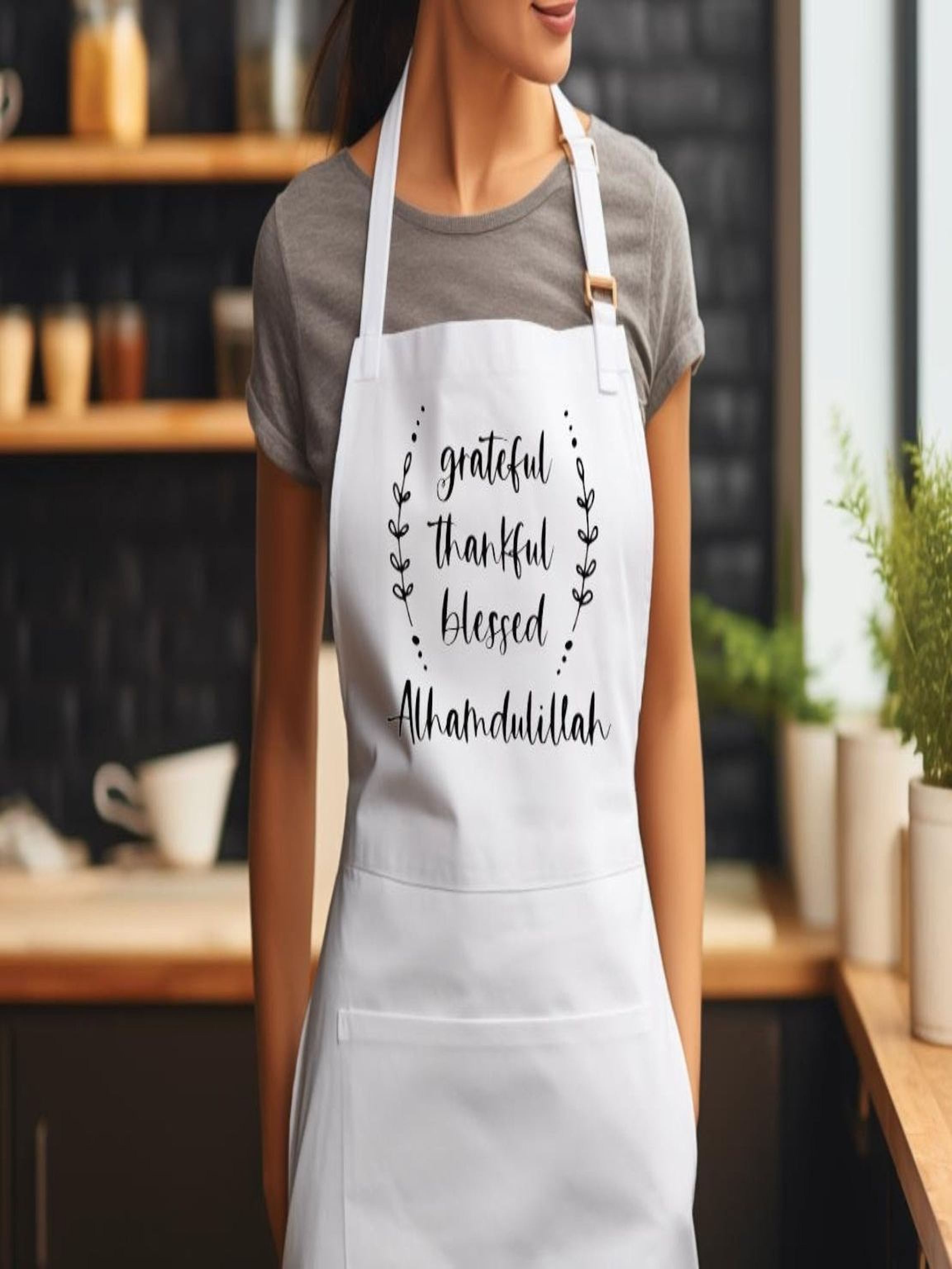wearing white Grateful Thankful Blessed Alhamdulillah Islamic apron in modern kitchen