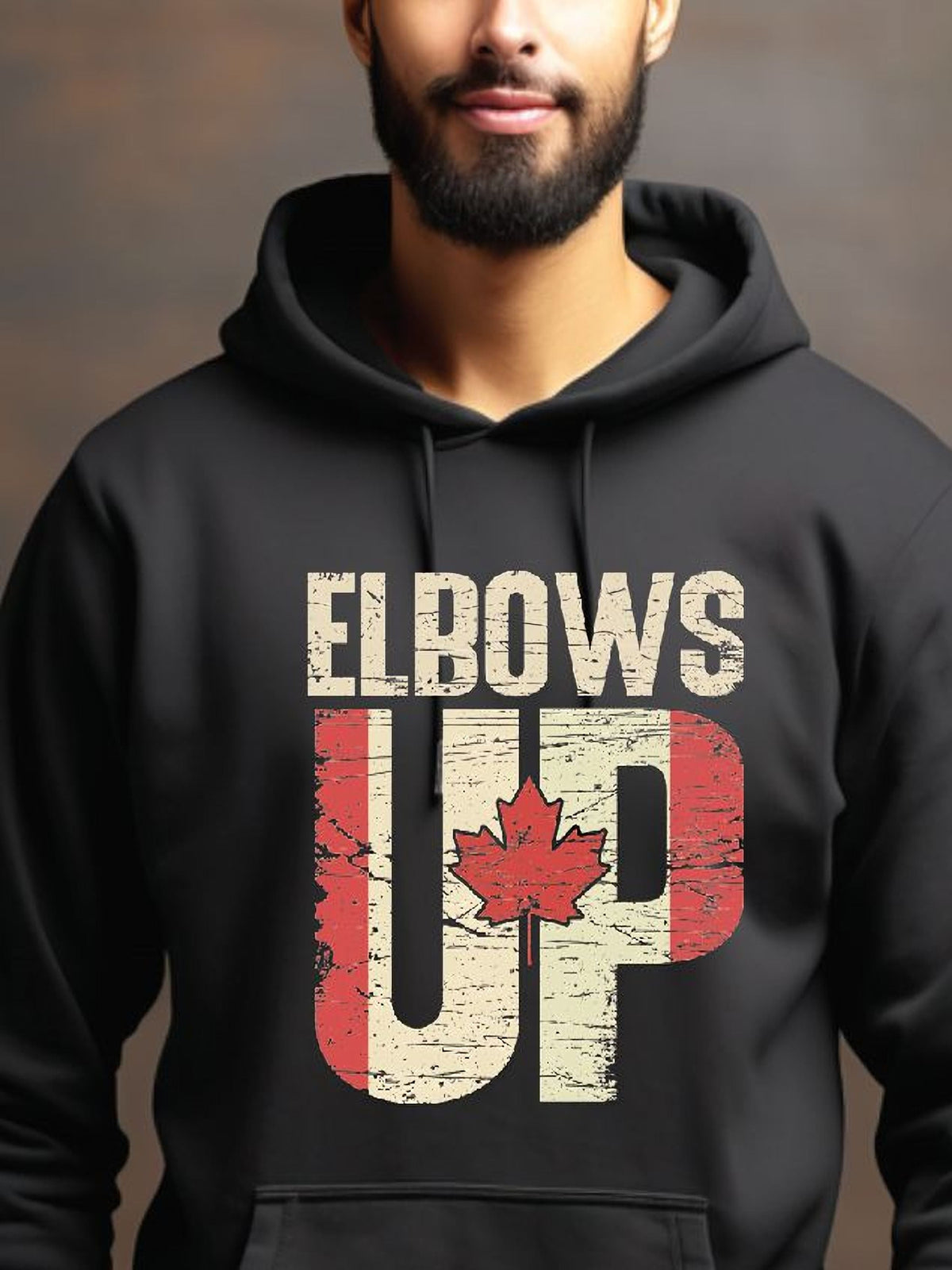 sweatshirt featuring an Elbows Up graphic with a distressed Canadian flag and red maple leaf design representing Canadian pride.