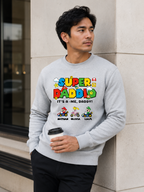 Super Daddio personalized sweatshirt featuring retro gamer-inspired colorful artwork and custom kids names worn by male model outdoors.