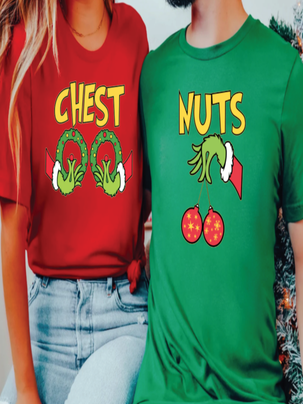 Two people wearing red and green t-shirts with humorous designs.