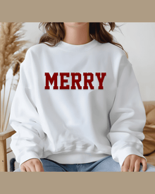 White festive hoodie with red MERRY graphic and soft fabric texture