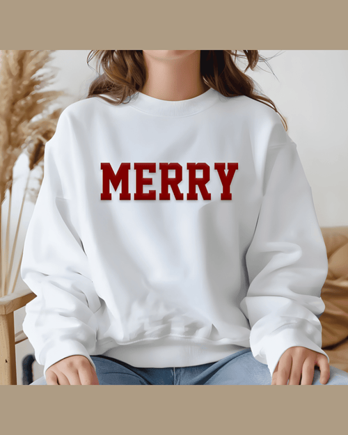 White festive hoodie with red MERRY graphic and soft fabric texture