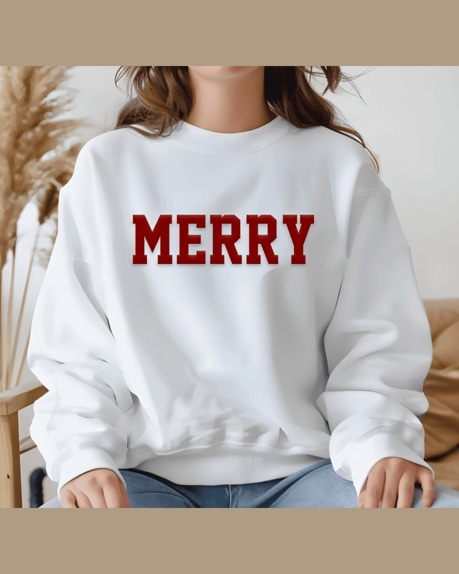 White festive hoodie with red MERRY graphic and soft fabric texture