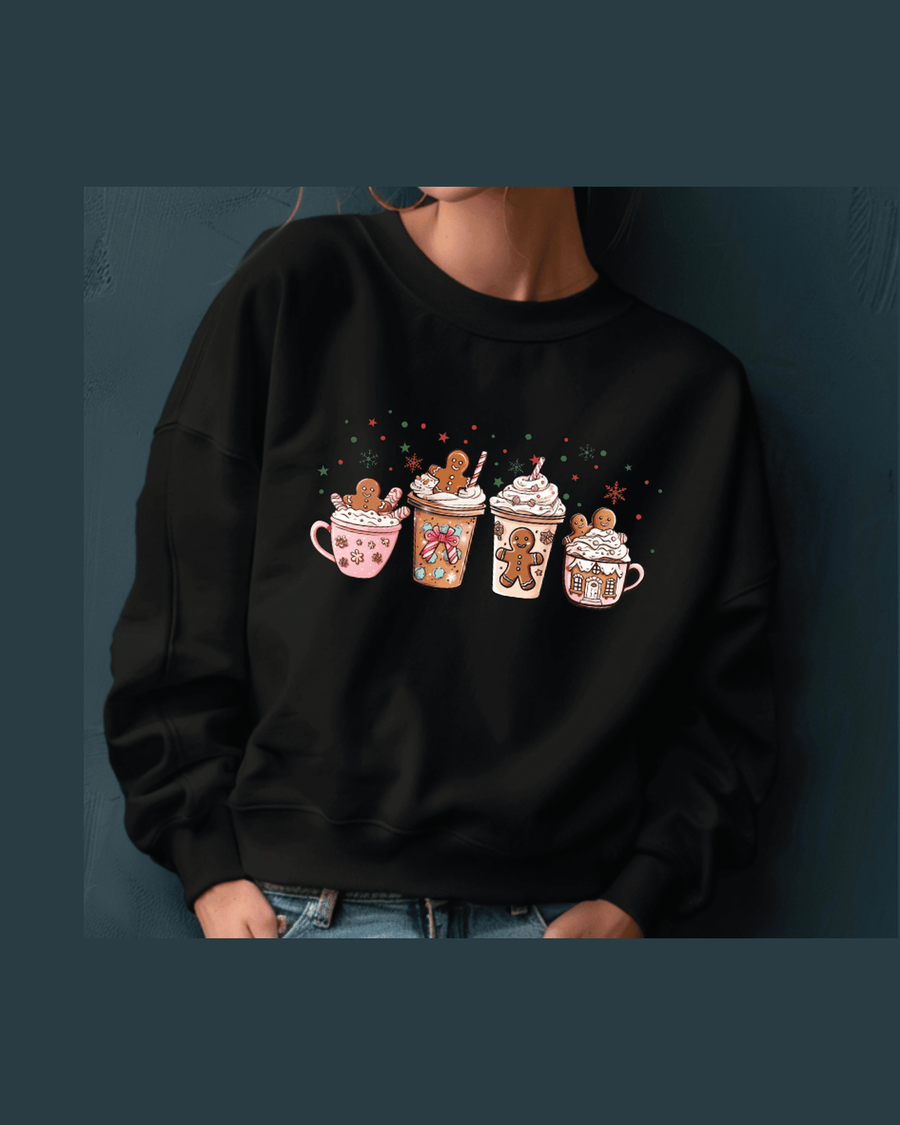 Black custom name hoodie with vibrant four-drink holiday graphic against dark teal wall