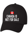 Black cap with 'Canada is not for sale' text and Canadian flag on a white background