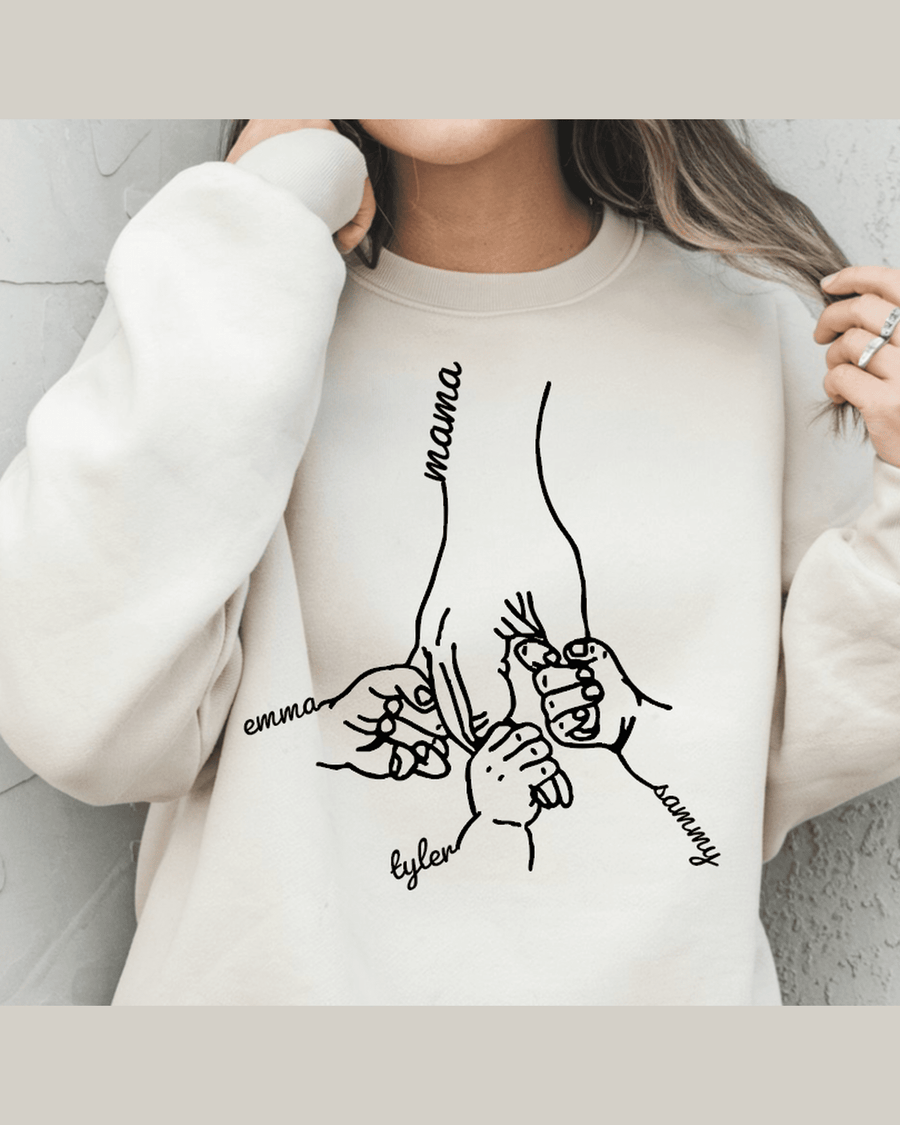 Cream personalized crewneck featuring four hand illustration with names Mama, Tyler, Emma, and Sammy