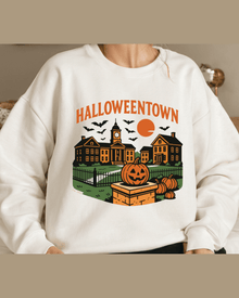 White long-sleeve hoodie with orange Halloweentown graphic art