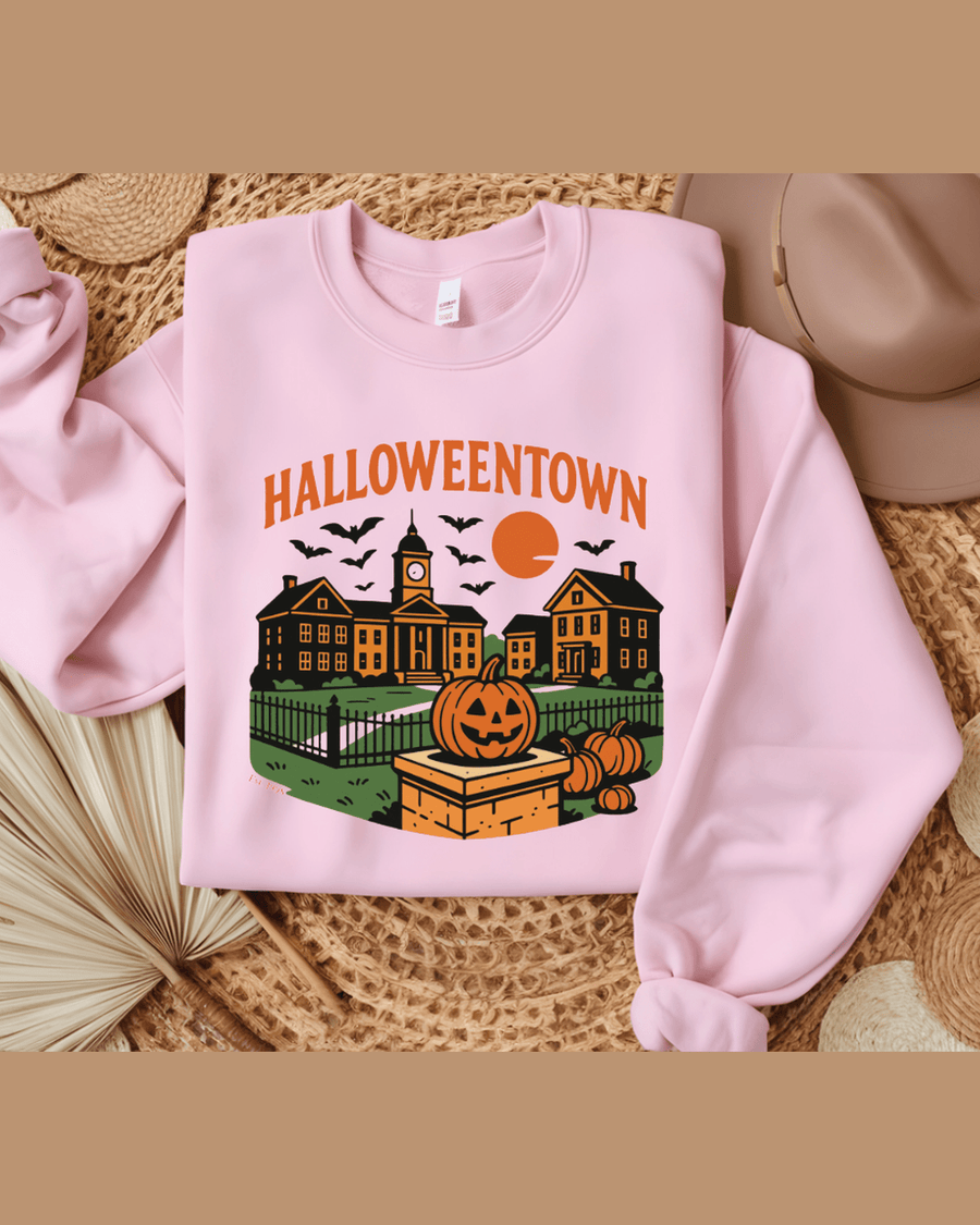 Pink folded personalized sweatshirt featuring Halloweentown design