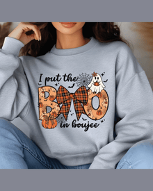 Heather gray crewneck hoodie with festive Halloween print and marled fabric texture