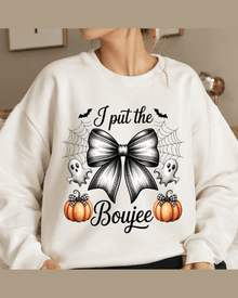 White fall graphic hoodie with 'I put the Boujee' text and spiderweb details