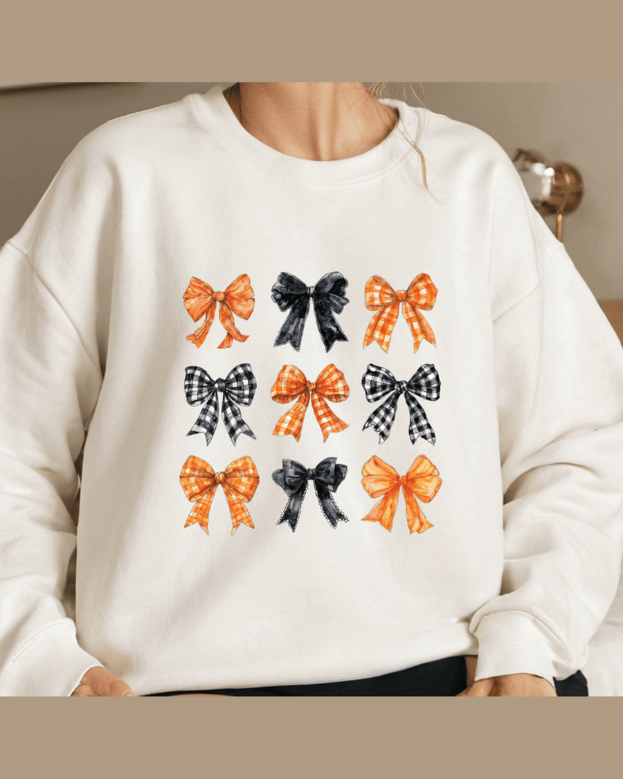 White unisex fit hoodie with orange navy black bow pattern