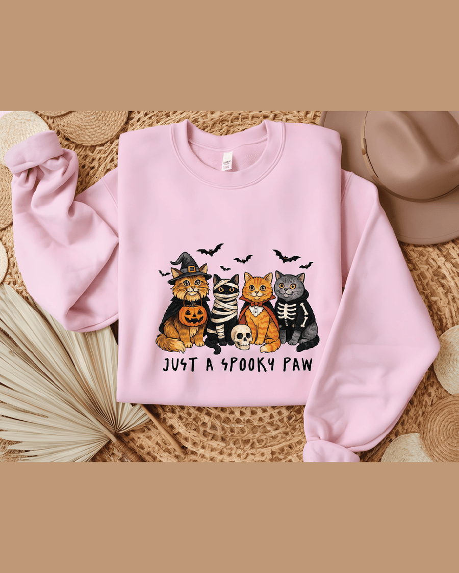 Pink custom graphic hoodie with Halloween cats and 'Just A Spooky Paw' text