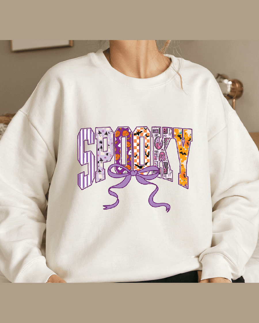 White personalized sweatshirt featuring Spooky Halloween lettering design