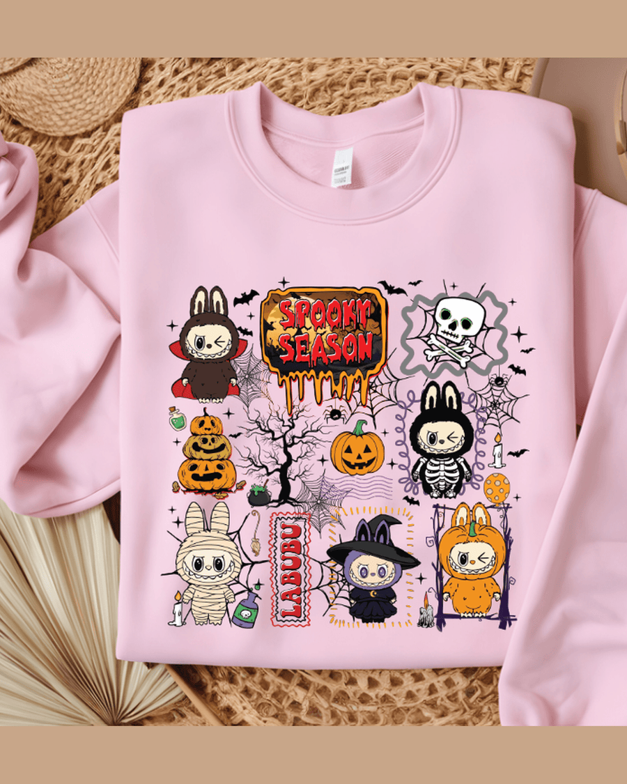 Pink Halloween graphic sweat tee with Spooky Season print and Labubu label