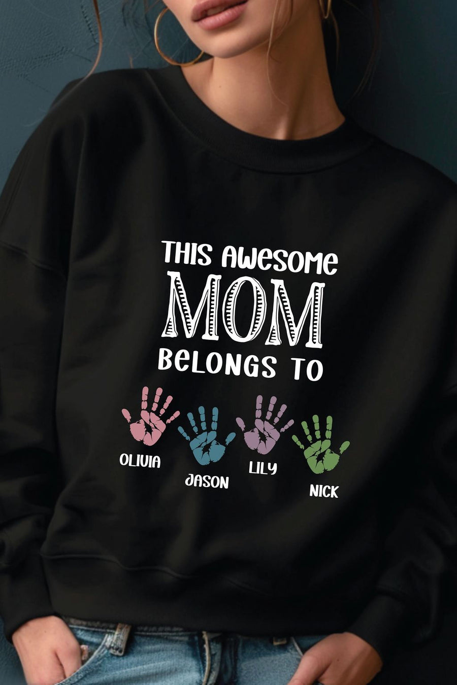 A woman wearing a black sweatshirt with a personalized message printed on it.