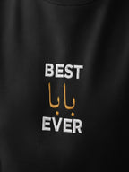 a black t-shirt with white text and two gold Arabic characters.