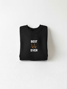 A black t-shirt with the text "BEST U'ER" printed on it.