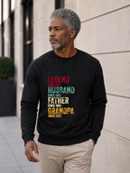 personalized Legend Husband Father Grandpa sweatshirt with vintage distressed typography and custom years worn by mature male model outdoors.