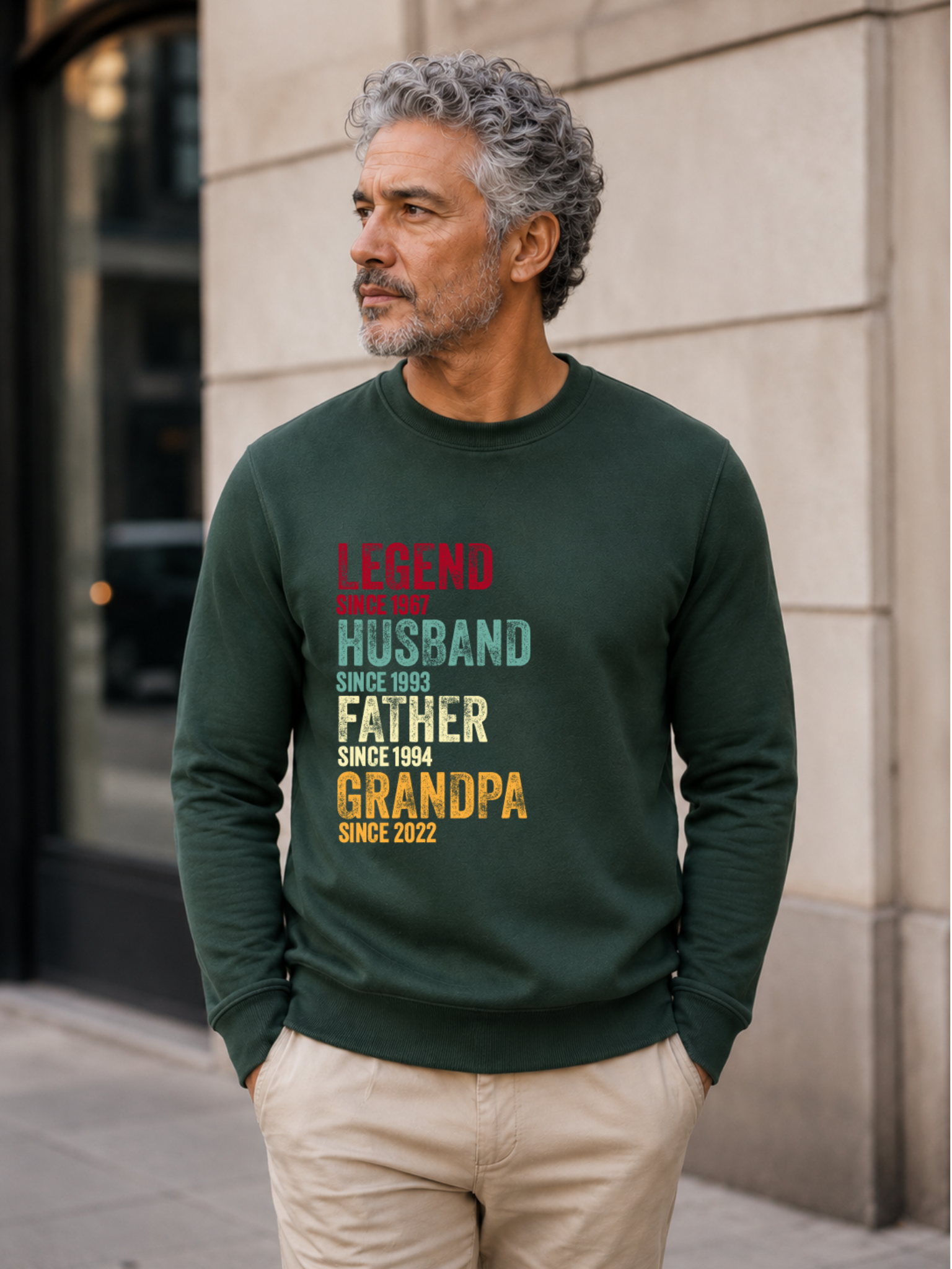 personalized Legend Husband Father Grandpa sweatshirt with vintage distressed typography and custom years worn by mature male model outdoors.