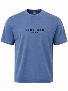 Vintage wash denim blue t-shirt mockup featuring a black puff print “Girl Dad” design with raised Siser Easy Puff vinyl texture. Premium minimalist Father’s Day graphic tee shown in angled close-up product photography with soft washed fabric detail.
