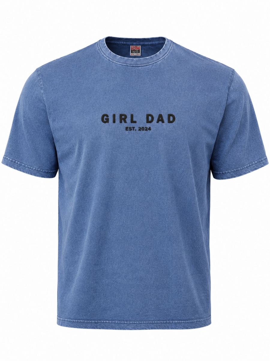 Vintage wash denim blue t-shirt mockup featuring a black puff print “Girl Dad” design with raised Siser Easy Puff vinyl texture. Premium minimalist Father’s Day graphic tee shown in angled close-up product photography with soft washed fabric detail.