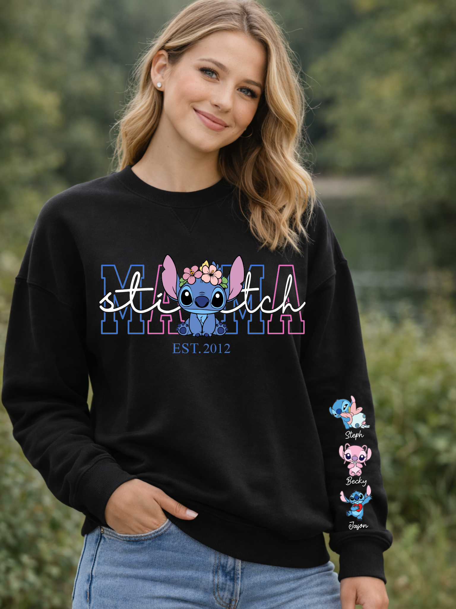 Person wearing a black sweatshirt with 'Stitch' design and text, standing outdoors.