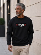 Top Dad sweatshirt featuring vintage distressed Father's Day graphic with patriotic stripes and star design worn by male model outdoors.